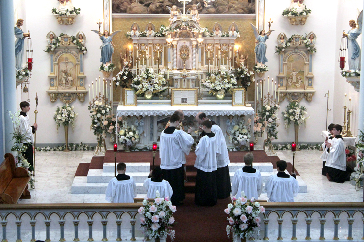 Students serve during the Forty Hours Devotion